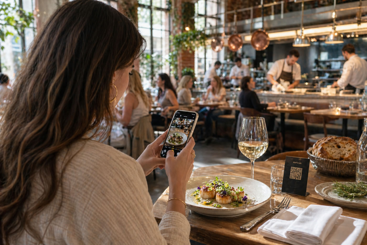 Restaurant QR code photo sharing - diners uploading food photos at the table